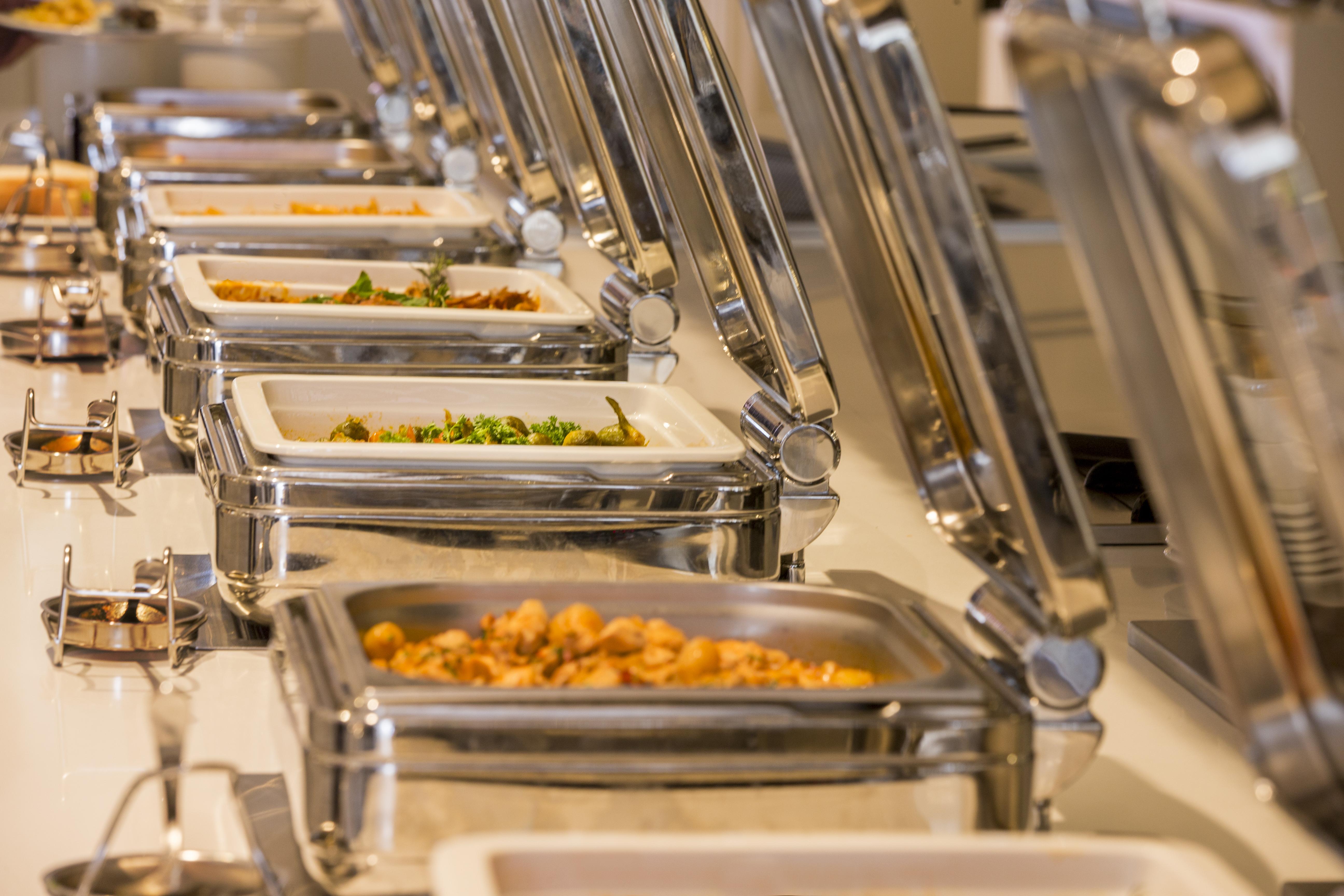 Innvista Hotels Belek Extérieur photo A row of chafing dishes